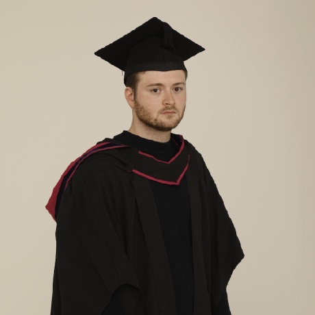 Fabio Rovai in academic cap and gown at his University of the Arts London graduation